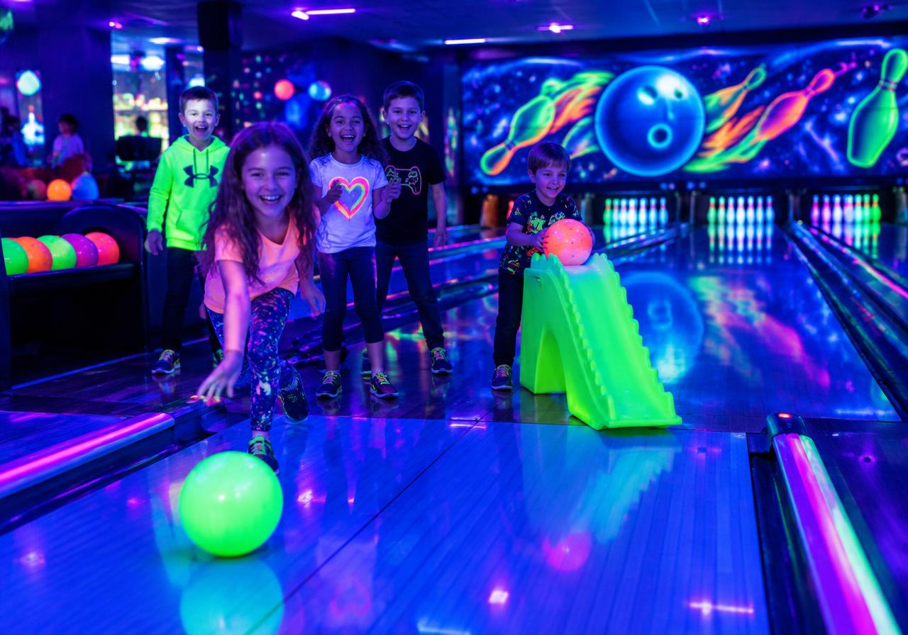 Children enjoying Glow Lanes
